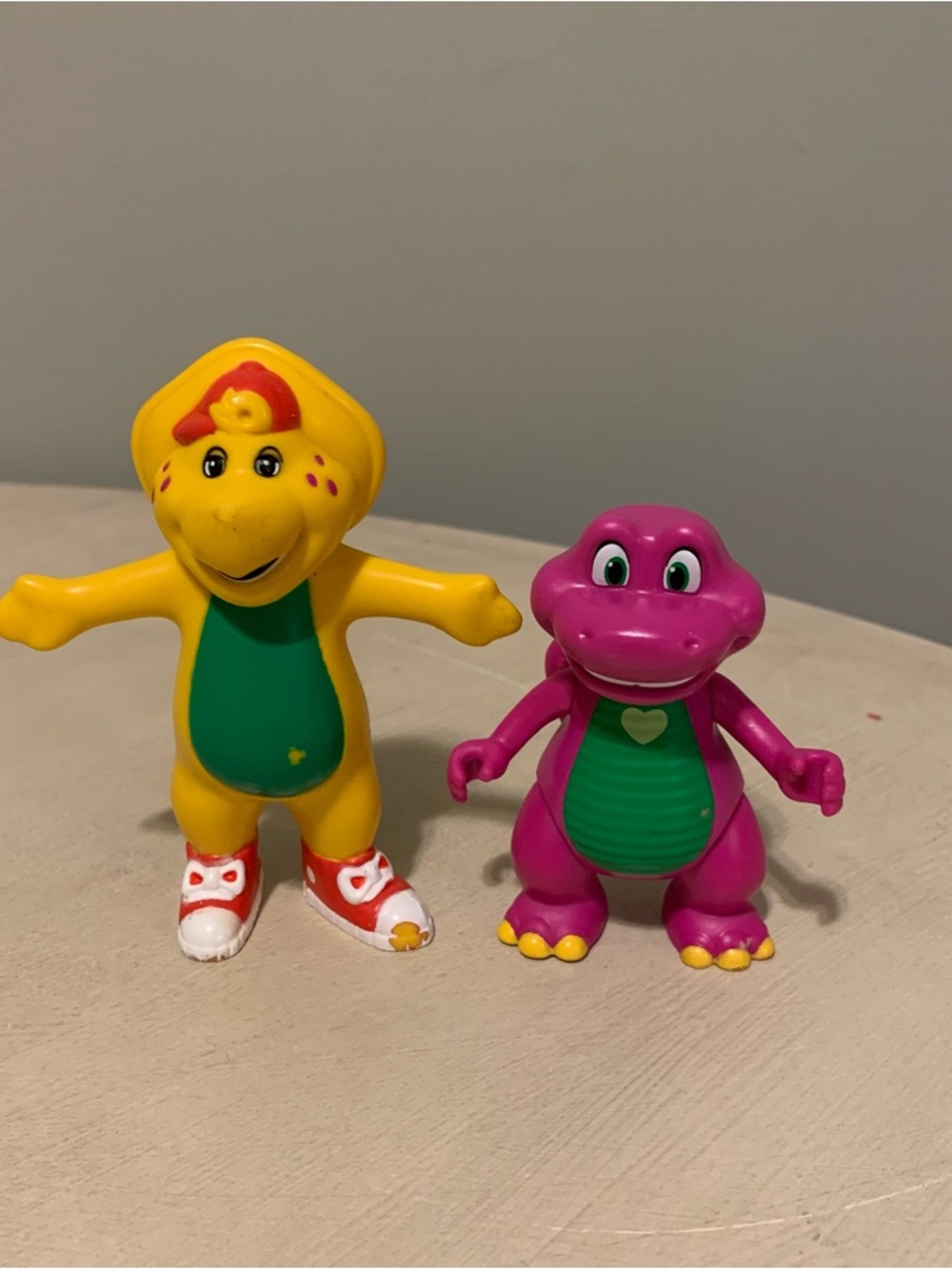 Barney and Friends. Barney and BJ, the yellow Protoceratops dinosaur.